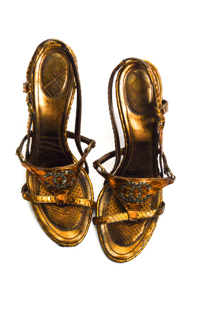 Chanel Copper Python Heels Featuring A Slingback Style And Studded CC